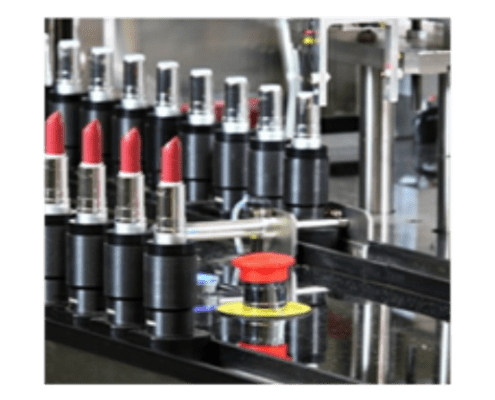 Lipstick cases on a conveyor belt