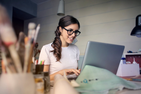 girl-using-laptop-1030x687