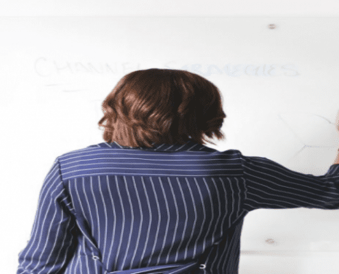 Woman using whiteboard