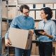 adults in a stockroom