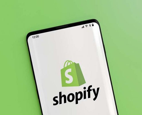 Shopify logo on a phone