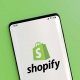 Shopify logo on a phone