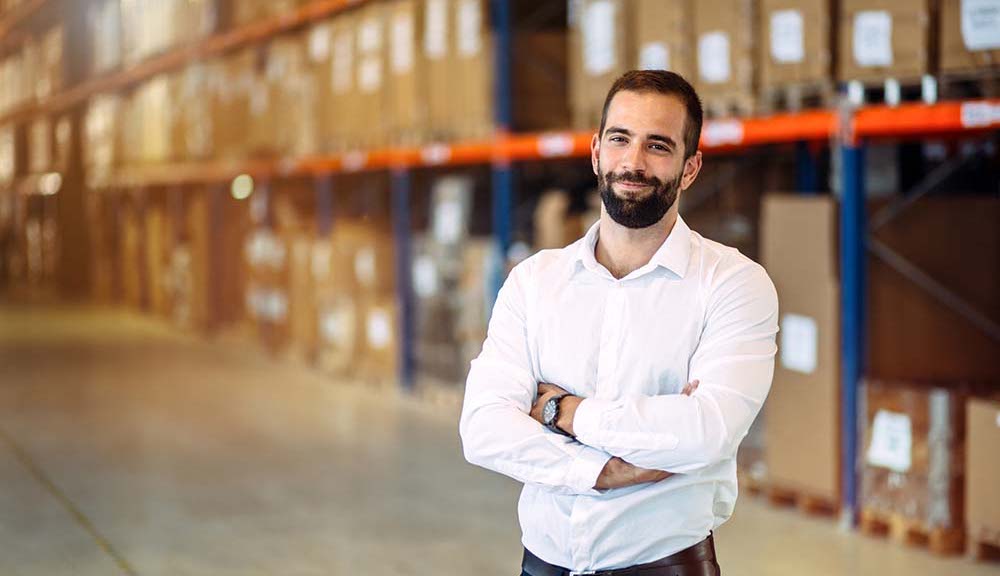 Multiple Warehouses person standing in a warehouse